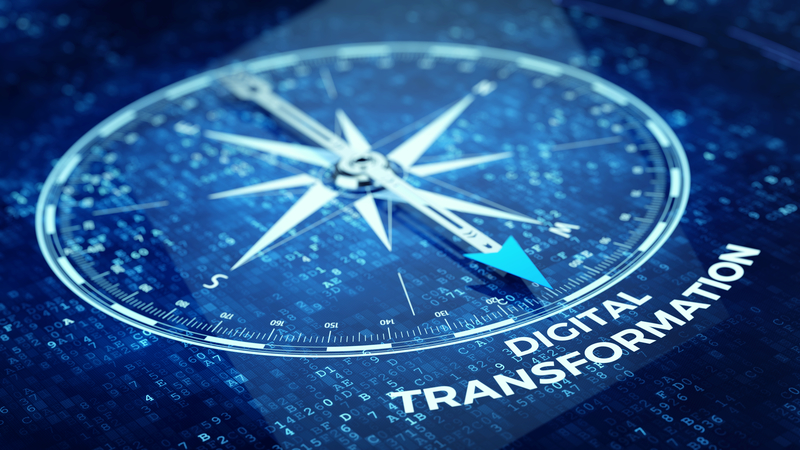 Digital Transformation concept - Compass needle pointing Digital Transformation word